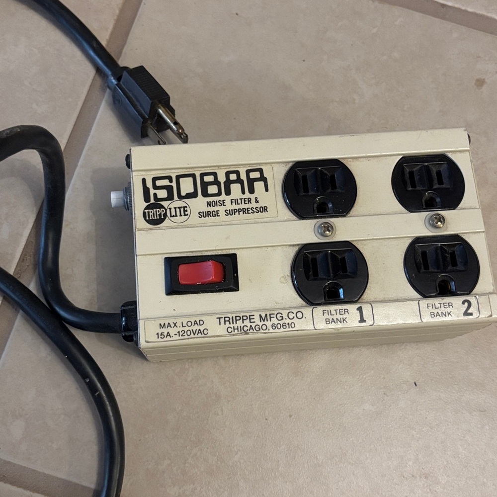 vintage Tripp Lite Isobar 4-outlet noise filter and surge suppressor trippe mfg